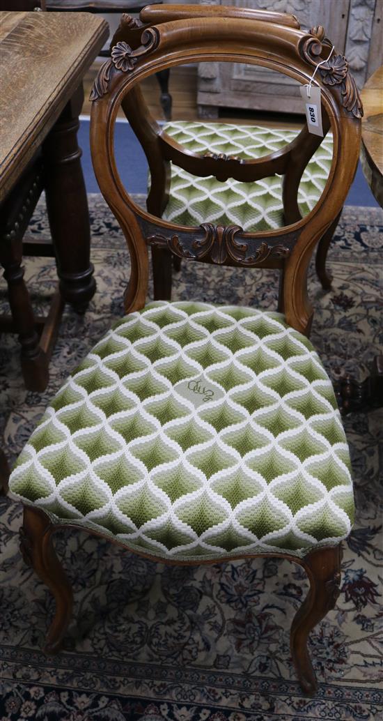 A set of six Victorian mahogany dining chairs, with tapestry upholstered seats